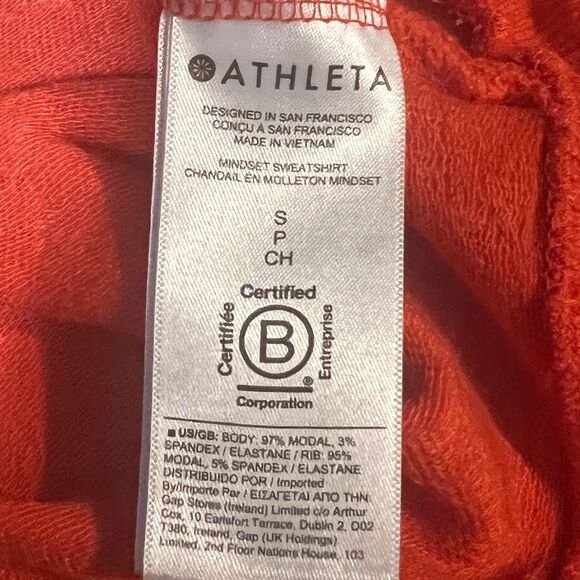 Athleta Women's Orange Haze Mindset Sweatshirt Relax Fit Tulip Hem Small NWOT - Picture 10 of 11